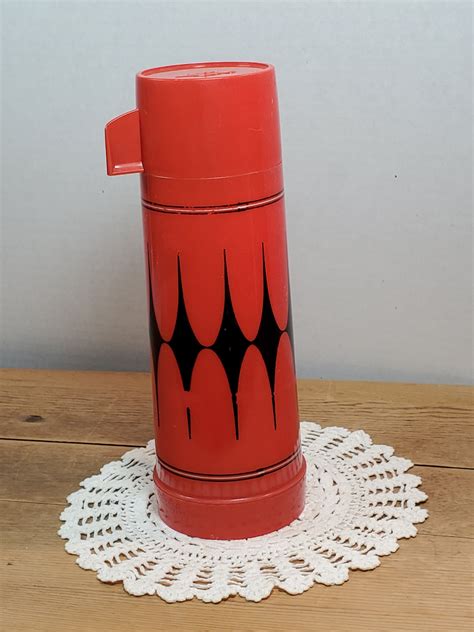 Wish Kid, Plastic Aladdin Thermos 1992, Vintage Never used a d vertisement b y TurnaboutCollectible Ad vertisement from shop TurnaboutCollectible TurnaboutCollectible From shop TurnaboutCollectible 12. . Aladdin thermos vintage
